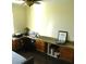 Home office with built-in granite desk and cabinets at 8230 Moapa Water St, Las Vegas, NV 89131