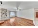 Living room with hardwood floors and a stone fireplace at 713 Sam Jonas Dr, Las Vegas, NV 89145