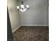 Bright dining area with chandelier and tile flooring at 3151 Soaring Gulls Dr # 1038, Las Vegas, NV 89128