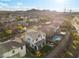 Aerial view of a house with a pool and backyard in a desert community at 14 Parco Fiore Ct, Henderson, NV 89011