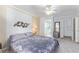 Bright bedroom with a comfortable bed and en-suite bathroom access at 2729 Long Ct, Las Vegas, NV 89121