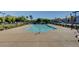 Relaxing community pool with plenty of lounge chairs at 4591 Woolcomber St, Las Vegas, NV 89115