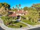 Aerial view of the property showing the house, landscaping and driveway at 14 Pheasant Ridge Dr, Henderson, NV 89014