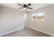 Bright bedroom with ceiling fan and window views at 1743 Eddingham Ct, Las Vegas, NV 89156