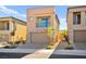 Two-story modern home with a brick facade and attached garage at 9851 Mojave Mountain St, Las Vegas, NV 89166