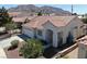 Single story home with tile roof and desert landscaping at 6529 Cordelle Dr, Las Vegas, NV 89156