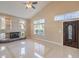 Bright living room featuring a fireplace and large windows at 1675 Silver Rain Ave, Las Vegas, NV 89123