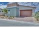 Modern single story home with two car garage and landscaped yard at 9927 Evergreen Pine St St, Las Vegas, NV 89166