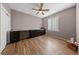 Home office with wood flooring and built-in desk at 2506 Starlight Valley St, Henderson, NV 89044