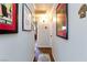 Bright hallway with wood flooring and framed art at 2008 Franklin Ave, Las Vegas, NV 89104