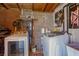 Bright laundry room with washer, dryer, and storage shelves at 2008 Franklin Ave, Las Vegas, NV 89104