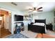 Bedroom with a view of the bathroom and a large TV at 2008 Franklin Ave, Las Vegas, NV 89104