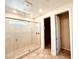 Spa-like bathroom with a large walk-in shower and tile flooring at 127 Medianoche St, Las Vegas, NV 89138