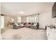 Spacious living room featuring a large sectional sofa at 3187 Silver Saddle St, Las Vegas, NV 89169