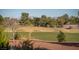 Landscaped green space with views of mountains in the distance at 3368 Epson St, Las Vegas, NV 89129