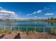 Serene lake with walking path and lush landscaping at 724 Last Dance Pl, Henderson, NV 89011