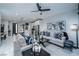 Open concept living room featuring a neutral color palette and modern furniture at 724 Last Dance Pl, Henderson, NV 89011