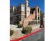 Well-maintained building exterior with gated entry at 1404 Seward St # 104, Las Vegas, NV 89128