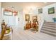 Grand entryway with staircase, decorative console table, and hardwood floors at 1164 Sparta Crest Street, Henderson, NV 89052