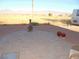 Peaceful backyard patio with fire pit and mountain views at 2231 S Blagg Rd, Pahrump, NV 89048