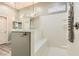 Spa-like bathroom with large shower, built-in bench, and double sinks at 5790 Douglas Everett St, Las Vegas, NV 89120