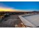 View from the backyard stairs with a sunset landscape view at 608 N Racetrack Rd Rd, Henderson, NV 89015