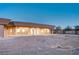 Backyard view of house with access to outdoor living spaces at 608 N Racetrack Rd Rd, Henderson, NV 89015