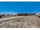 Expansive front yard with a long driveway at 608 N Racetrack Rd Rd, Henderson, NV 89015