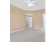 Primary bedroom with ceiling fan and access to bathroom and closet at 830 Carnegie St # 1311, Henderson, NV 89052