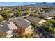 Aerial view of a residential neighborhood with houses and mountain views at 2315 Meteor Shower St, Henderson, NV 89044