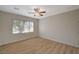 Bright bedroom with wood-look floors and window at 2315 Meteor Shower St, Henderson, NV 89044