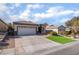 Single-story house with a two-car garage and neatly landscaped yard at 2315 Meteor Shower St, Henderson, NV 89044