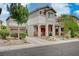 Two-story house with attached garage and landscaping at 6040 Sea Cliff Cove St, North Las Vegas, NV 89031