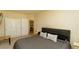 Spacious bedroom with a large bed and ample closet space at 1430 October Oak Ave, Las Vegas, NV 89123