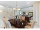 Formal dining room showcasing a wood table and access to the living room at 8207 Crow Valley Ln, Las Vegas, NV 89113