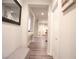 Bright hallway with bench and view to living area at 5953 Graystone Ridge Ave, Las Vegas, NV 89141