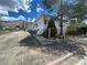 House exterior view, showing front yard and landscaping at 47 Fourth St, McGill, NV 89318