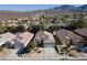 Aerial view of houses and neighborhood at 2516 Cosmic Dust St, Henderson, NV 89044