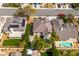 Aerial view showing the house, pool, and surrounding landscape at 5413 Carnation Meadow St, Las Vegas, NV 89130