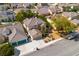 Aerial view showcasing home's size and backyard space in relation to neighboring houses at 5413 Carnation Meadow St, Las Vegas, NV 89130