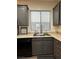 Kitchen with gray cabinets and a double sink at 2929 Salado Creek Ave, North Las Vegas, NV 89081