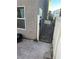 Small backyard with gravel pathway and gate access at 3626 Via Del Robles Ave, Las Vegas, NV 89115