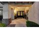 Covered entry with decorative door and planters at 4744 Laurentia Ave, Las Vegas, NV 89141