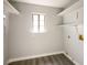 Laundry room with built-in shelving and window for natural light at 1967 N Moapa Valley Blvd, Logandale, NV 89021