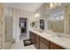 Spa-like bathroom with double vanity and walk-in shower at 7208 Grace Estate Ave, Las Vegas, NV 89113