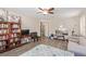 Bedroom with built-in shelving and home gym equipment at 3040 Lenoir St, Las Vegas, NV 89135