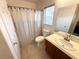 Bathroom with shower/tub, toilet, and vanity at 3519 Hammock St, Las Vegas, NV 89147