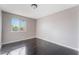 Spacious bedroom with dark hardwood floors and neutral walls at 6120 Edgewood Cir, Las Vegas, NV 89107