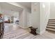 View of entryway with wood-look floors and staircase at 4050 Peaceful Dune St, Las Vegas, NV 89129