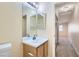 Bathroom with single sink vanity and view of bedroom at 511 Escoto Pl, Henderson, NV 89052